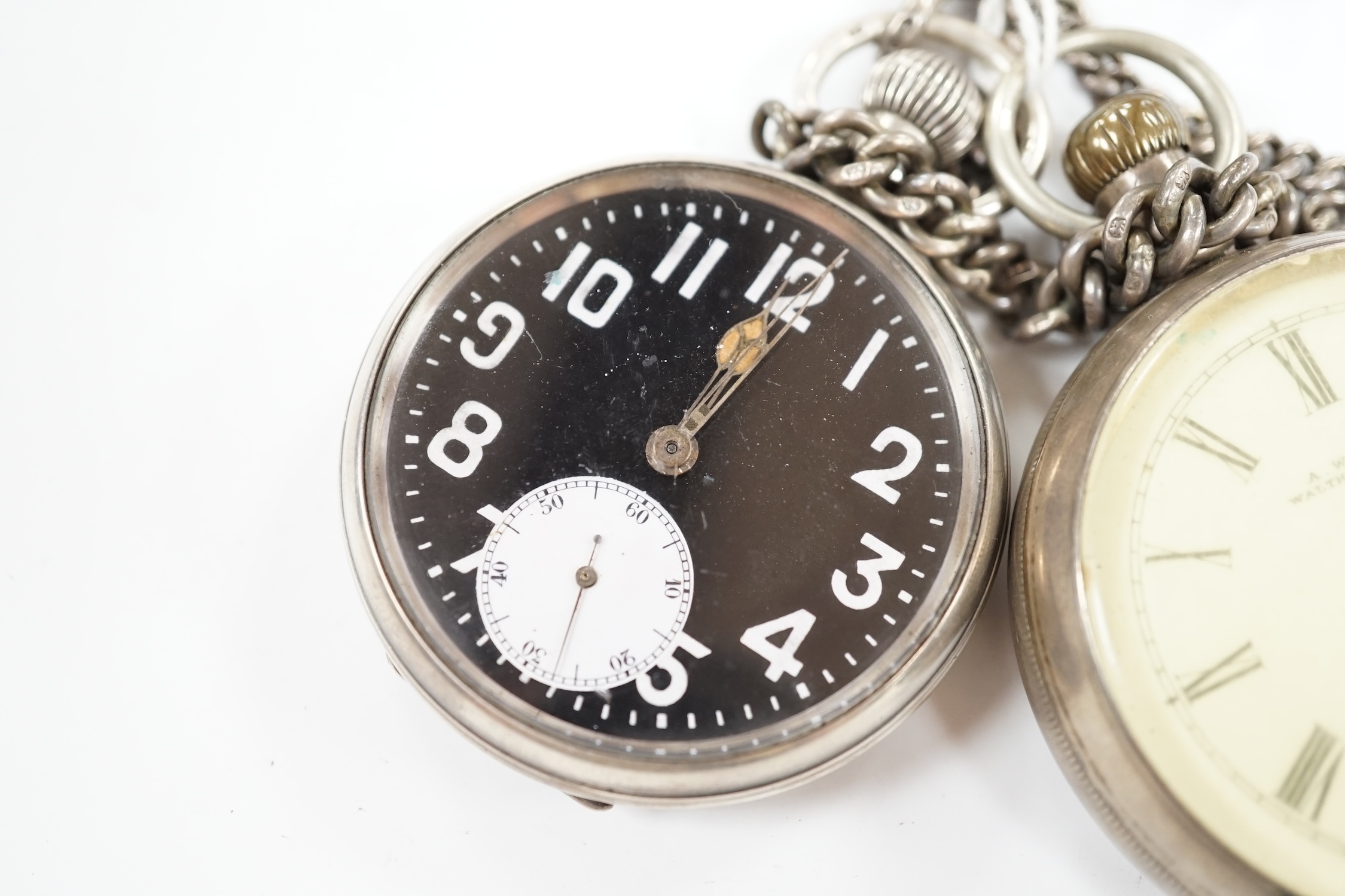 A silver open faced black dial pocket watch with a silver albert, together with a silver Waltham open face pocket watch, with Roman dial. Condition - poor to fair